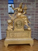 Empire/Restoration style Pendule with a lady in gilded bronze, France 1830