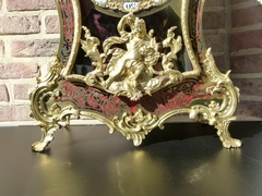 Louis 15 style Boulle cartel in turtelshel and gilded bronzes, France 1870