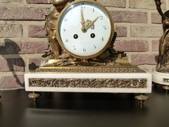Louis 16 style Clockset with cherub in gilded bronze and white marblee, France 1890