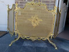 Louis 16 style Fireplace screen in gilded bronze, France 1900