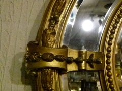 Napoleon III style Huge gilded oval mirror with putto,s, France 1880