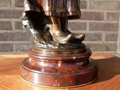 Napoleon III style Scculpture by Maubach of a farmer lady in multi patinated bronze on griot marble base, France 1880