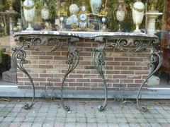 style A pair wrought iron consoles with marble top in iron and marble, France 1900-1920