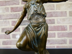 Art-deco style Sculpture of a oriental dancing lady by Omerth  in patinated bronze on marble base, France 1925