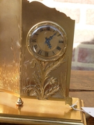 Asiatique style Clock with ivory made by Hour Lavigne in gilded bronze and ivory, France 1940