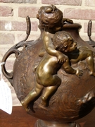 Belle epoque style bronze vase with putto,s on red marble base in patinated bronze, France 1890