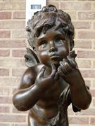 Belle epoque, style Sculpture of a putto in patinated bronze, France 1880,unsigned probaply Moreau