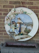 Belle epque style Huge porcelain plate with a romantic scene in faience porcelain, probably Germany 1920
