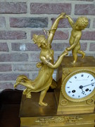 Empire style Miniature pendule clock with a lady and child in gilded bronze, France 1815