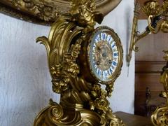 Louis 15 style Clockset in gilded bronze 