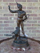 Napoleon III style Sculpture by barey fils of a harlequin with a dancing poodle in patinated bronze on a marble base, France 1880