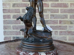 Napoleon III style Sculpture by barey fils of a harlequin with a dancing poodle in patinated bronze on a marble base, France 1880