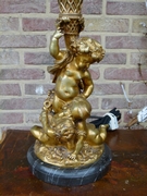 Napoleon III style Table lamp with 3 cherubs-putto,s in gilded bronze on marble base, France 1890