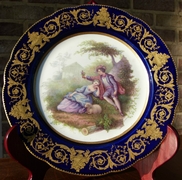 style Sévres plate with romantic scene in porcelain, France 1920