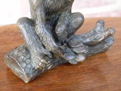 Signed with a V.1902 style Miniature bronze sculpture of a monkey in patinated bronze 1900