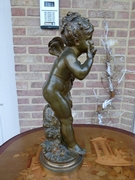 style Sulpture by Auguste Moreau of a winged putto giving hand kisses in patinated bronze, France 1880